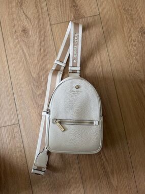 kate spade Ivory Pebbled Leather Mini Backpack with Striped Strap